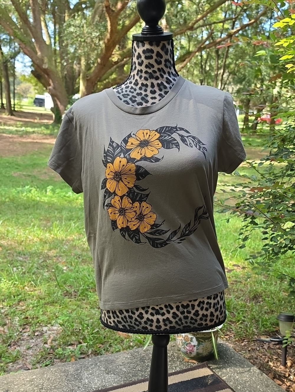 Black Floral Crescent Moon Olive Green Tee with Yellow Floral Wreath